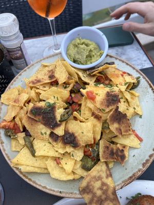 Nacho plate minus the cheese (was not possible to change to vegan cheese without extra cost, which was quite annoying)  at Surfside in Sliema