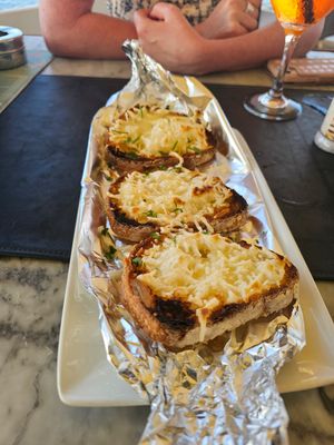 Vegan garlic bread, nothing special - just melted vegan cheese with some garlic. at Surfside in Sliema