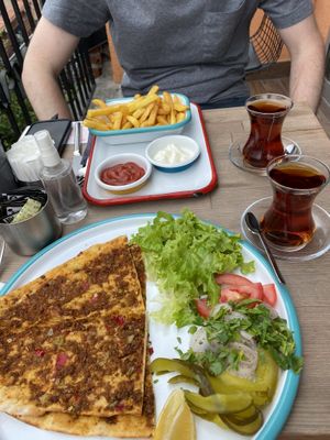 Vegan lahmajoun with fries and tea.   at Veganarsist - Balat in Istanbul