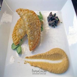 Crispy skordallia perogies: Potato-pistachio stuffing, cumin roasted eggplant puree, Greek olive salad $10 at Horizons in Philadelphia