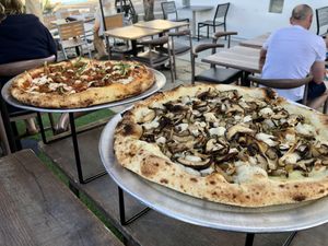 Mushroom pizza and sausage pizza  at Margo's in Santa Monica