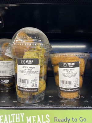 Clearly marked vegan 🌱spinach pakora and falafel   at Nature's Fare Markets - Penticton in Penticton
