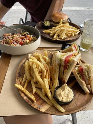 Club sandwich, vegan burger and a salad at My Habit in Corfu