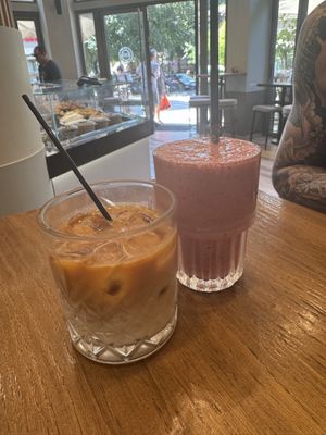 Iced latte with soy milk & strawberry, cherry & chia smoothiee  at My Habit in Corfu