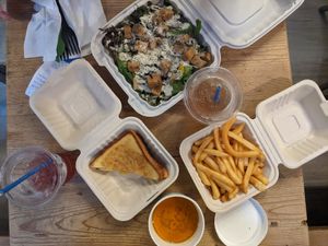 Caesar salad, 1/2 grilled cheese with tomato bisque, french fries at Innocent Yesterday in New York City