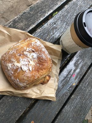 Almond croissant and coffee   at Innocent Yesterday in New York City