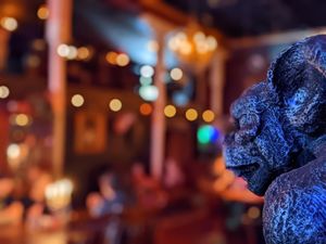 Gargoyles guard the dining room at Raven's Manor in Portland