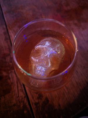 I've already forgotten the name of this cocktail, but the glittery skull ice cube was delightful. at Raven's Manor in Portland