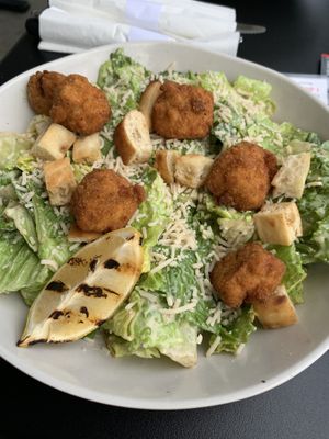 Caesar salad with chicken popcorn bites  at Veggie Grill by Next Level in Santa Monica