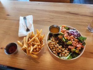 Fries yummy and crispy. This is the bacon salad, so much included 😋 at Veggie Grill by Next Level in Santa Monica