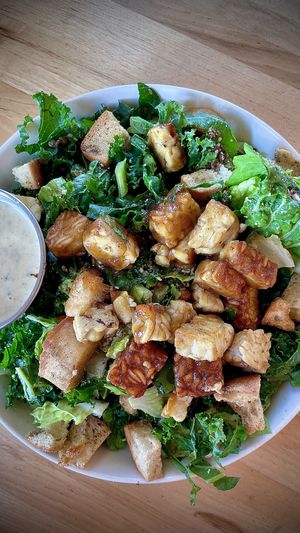 Kale Caesar salad with Tempe  at Veggie Grill by Next Level in Santa Monica