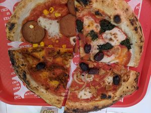 Holy Pepperoni, Spinaci, Don Tuna, Creek Supreme at Pizzi*s & Cream in Vienna