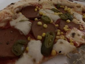 Pepperoni pizza with mozzarella and jalapeños, all vegan of course 💚  at Pizzi*s & Cream in Vienna