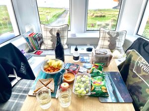 After a long day we didn't feel like eating in a restaurant anymore, we had a nice meal in the room with what we bought in the local shop in Dunvegan. With a beautiful view of the sea! at Sgarbh Lodge in Isle Of Skye