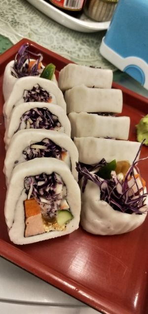 One of their signature dishes, wrapped with yam instead of seaweed. Taste super good.  at Chijuya Restaurant - Jing Xin Health Food in Bangkok