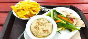 Hummus plus fries at Pántlika in Budapest