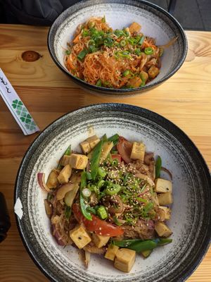 Two of the noodle bowls with tofu instead of meat at Momo Wok Box in Copenhagen