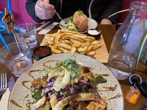 From top: ‘egg’ sandwich, bonobo fries, bang bang salad  at Bonobo Cafe in Christchurch