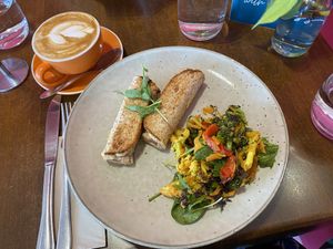 Flat white, cheese rolls and side salad   at Bonobo Cafe in Christchurch