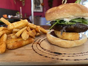 Mushroom burger with side of fries   at Bonobo Cafe in Christchurch