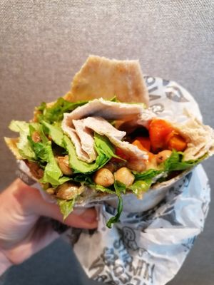 Hummus wrap with tomatoes and lettuce at Isla Vegana in Ushuaia