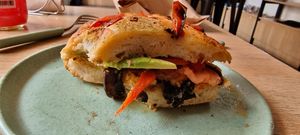 Focaccia Isla (from menu). It is quite a large portion. I forgot to take a picture before eating most of it 🤭 at Isla Vegana in Ushuaia