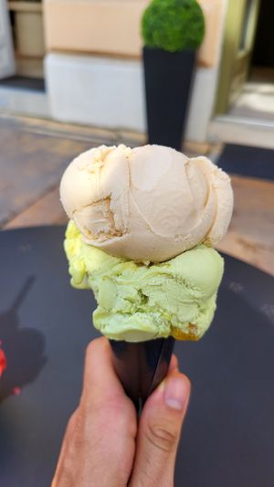 Hazelnut and matcha peach (mixed flavor portion size) at Vigó - Kongresni Trg in Ljubljana