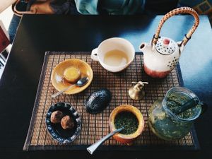 Pictured is a dosha balancing tea & the citrus terreré (in a calabash with a bombilla) with the vegan truffles. at Veda House - Sofia in Sofia