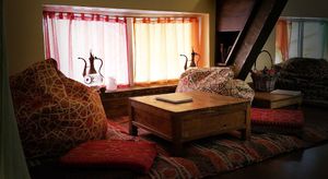 You can actually take off your shoes and sit... well even lie on the pillows.  at Veda House - Sofia in Sofia