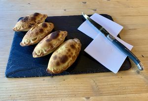 4 empanadas for 14 euros. i got two takitori and two dahl  at Toké Vieux in Lyon