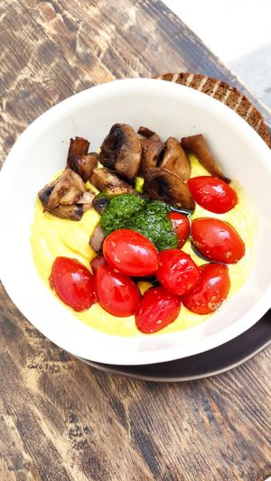 Hummus with tomatoes and mushrooms at Floresta Café in Porto