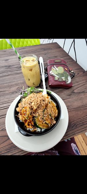 Tuna Sushi Bowl and Mango yogurt smoothie 🤤 at Cocina Plantosaurus in Charles Town