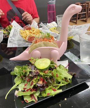 Black bean and impossible meat tacos with a side salad. Delicious!  The empanadas were eaten so fast we didn’t get a picture    at Cocina Plantosaurus in Charles Town