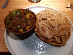 Spicy veggie curry and flakey pancake at Little Andaman in Barcelona