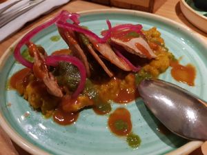 Spiced chickpeas and homemade crackers at Little Andaman in Barcelona