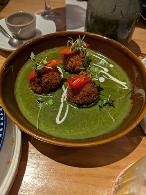 Soy meatballs with spinach curry at Little Andaman in Barcelona
