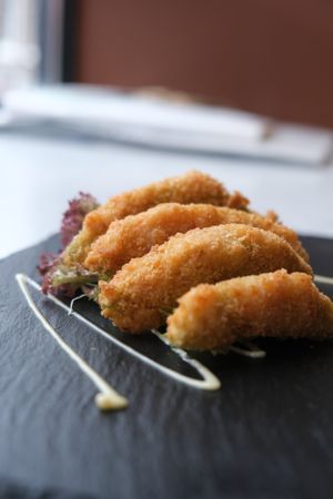 Crispy avocado bites (vegan)
 at Full Moon Express in The Hague