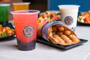 Watermelon bubble tea with classic egg waffle (vegetarian) at Full Moon Express in The Hague