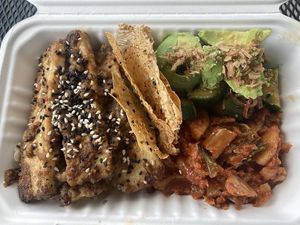 Peanut-sauce Tofu Rice Bowl, Avocado & Cucumber Salad, and Vegan Kim Chi  at Dinky Dau in Bend
