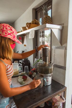 Coco making another fabulous juice!
 at Surf's Up Smoothies in Todos Santos
