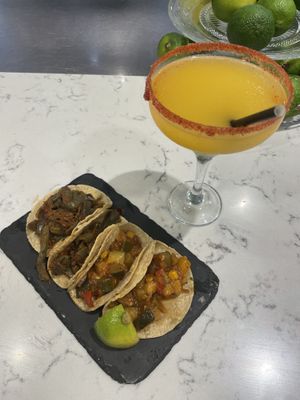 Tacos de calabacín ranchero y tacos de nopales + mango margarita   at Tiki Taco - Clavel in Madrid