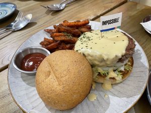 Impossible “cheese”burger with sweet potato fries   at Be With Years in Kowloon