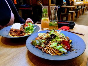 Fried udon with vegan bacon, and rice with mango cream and vegan shrimps. at Sakura in Mannheim