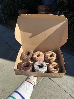 Vegan donuts! Spiced chocolate, Chocolate Rose, Chocolate Star Anise, and the October special flavors: Candied Orange Blossom and Cinnamon Applee  at Dynamo Donut & Coffee in San Francisco