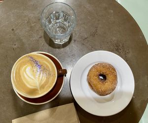 Apple cinnamon vegan doughnut and lavender mint oatmilk latte  at Dynamo Donut & Coffee in San Francisco