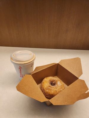 Oat milk latte and cinnamon apple donut at Dynamo Donut & Coffee in San Francisco