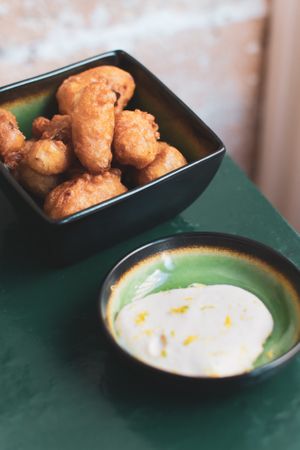 Shallot fritters + vinegar espuma at B.Better in Paris