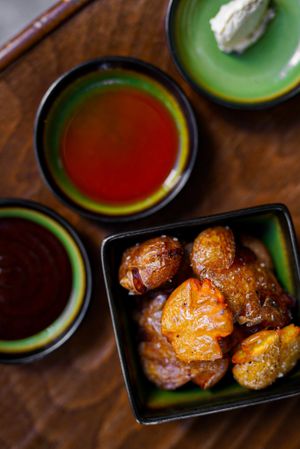 Crunchy potatoes with homemade sauces at B.Better in Paris