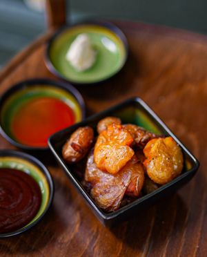 Crunchy potatoes with BBQ sauce, Hot Sauce & Vegan mayo at B.Better in Paris