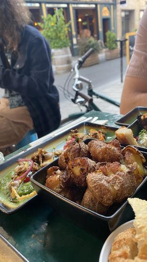 Potatoes and bar next door   at B.Better in Paris